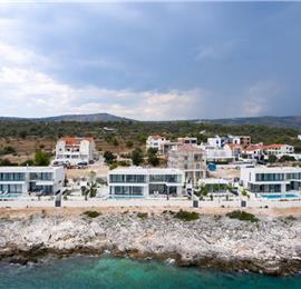 3 x 5 bedroom seafront villa with heated infinity pool near Rogoznica, sleeps 10
